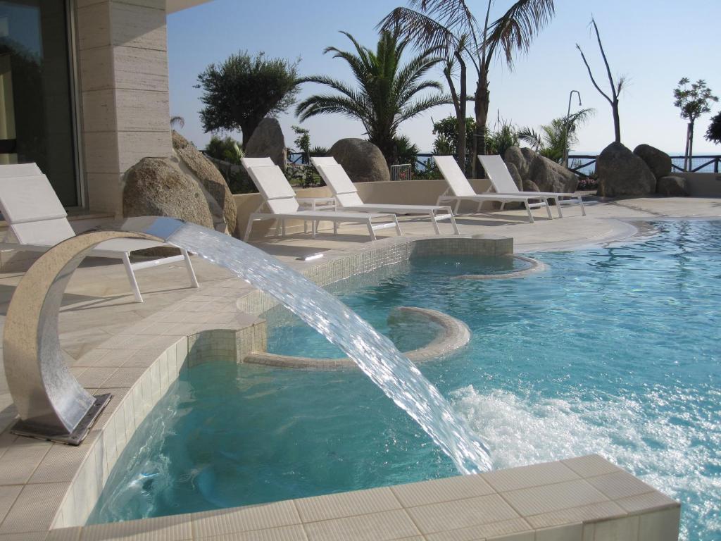 Hotel Villaggio Cala Di Volpe Капо Ватикано Екстериор снимка
