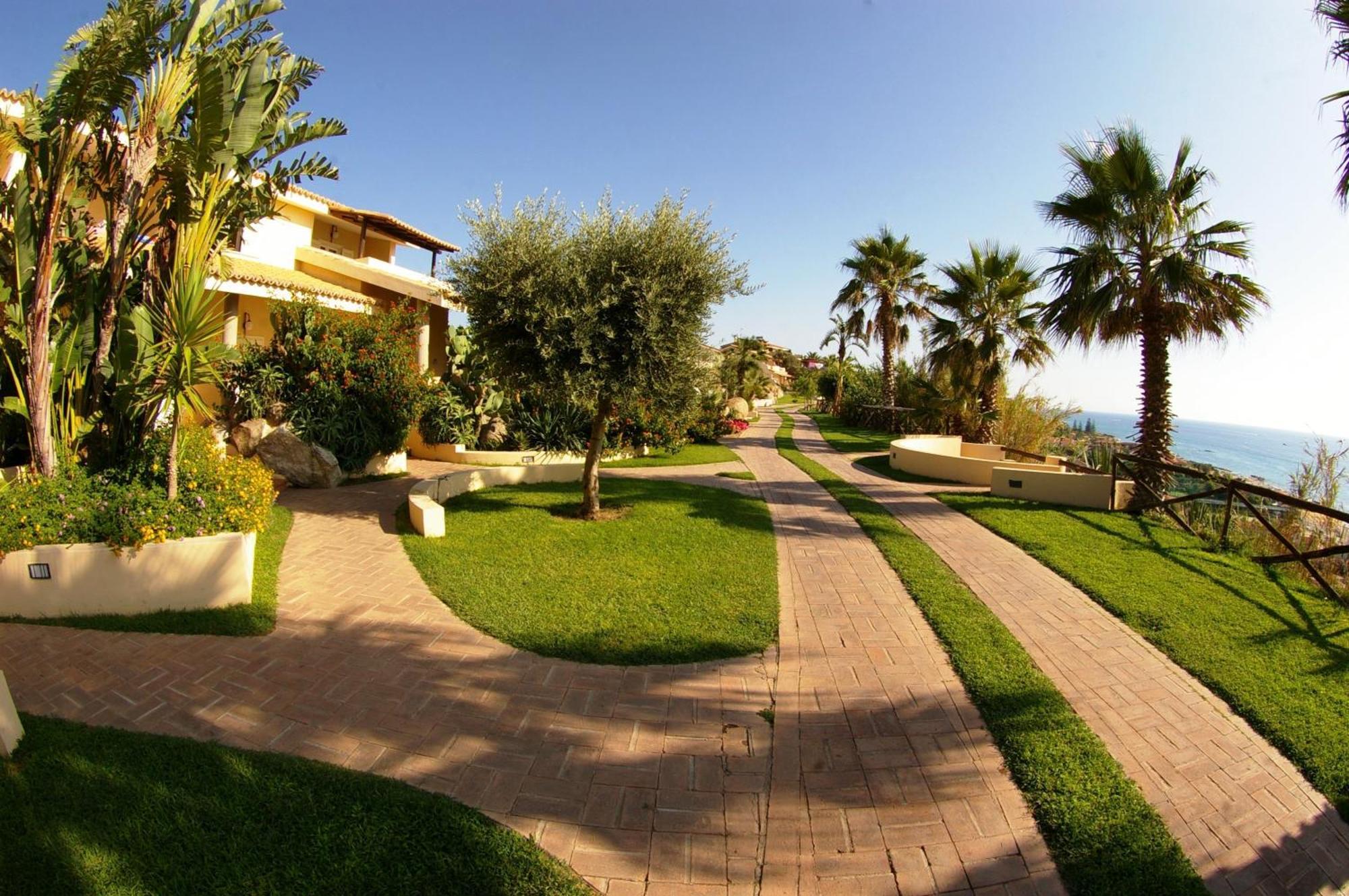 Hotel Villaggio Cala Di Volpe Капо Ватикано Екстериор снимка