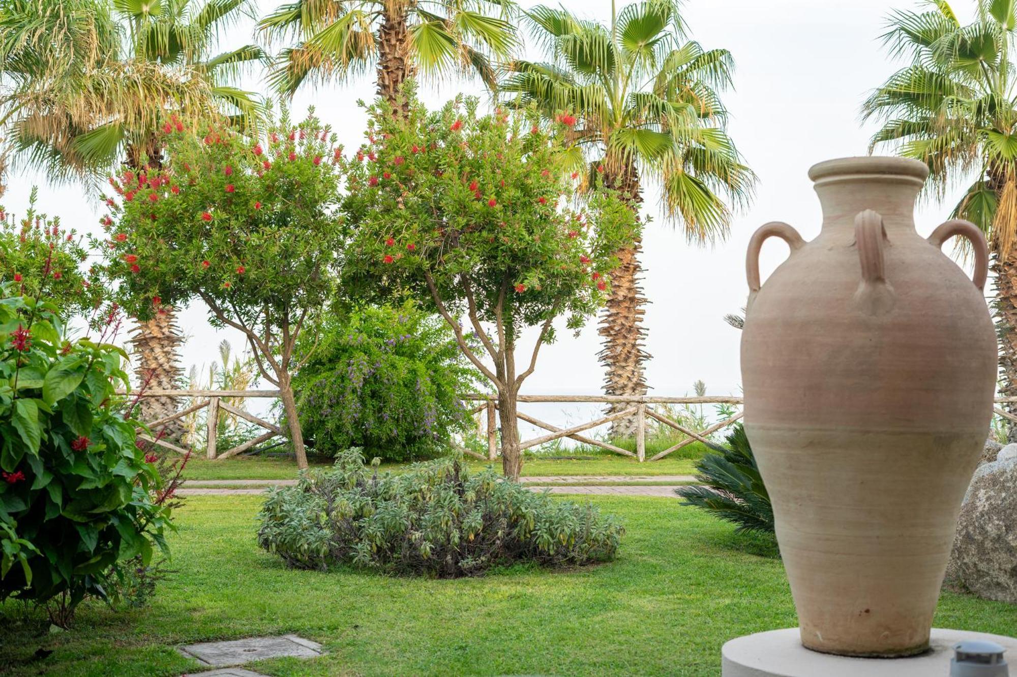 Hotel Villaggio Cala Di Volpe Капо Ватикано Екстериор снимка